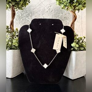 Macrae&Co elegant double sided flower necklace in silver and seashell.